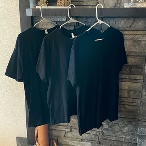 Three miscellaneous men’s XL black t shirts
